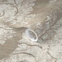 a close up view of a wallpaper with an intricate design on it's surface