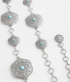 BKE Turquoise Concho Chain Belt - Silver L/XL, Women's Burnishedsilver Embossed metal 2 belt. WOMEN'S BELT SIZE CONVERSION CHART Jean Size 23-24 25-26 27-28 29-30 31-32 Belt Size XS S M L XL Belt Length** 34 37 40 43 46 *Conversion sizes may vary. **Measures from end to end excluding the buckle. These are general guidelines and sizing is dependent on belt being worn at natural waistline or the hip. Apparel & Accessories Women's Belts, Embossed Metal, Belt For Women, Belt Length, Conversion Chart, Women's Belt, Chain Belt, Belt Size, Belts For Women