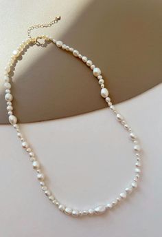 Indulge in the classic beauty of our Freshwater Pearl Necklace. Featuring pearls that boast a radiant glow and impeccable quality, this necklace is the epitome of elegance. Its versatile design makes it suitable for any occasion, from casual gatherings to formal events. Meticulously crafted, this piece promises to be a cherished addition to your jewelry collection." Pearl Necklace Handmade, Genuine Pearl Necklace, Handmade Beaded Necklace, Electroformed Jewelry, Handmade Beaded Necklaces, Baroque Pearl Necklace, Handmade Gifts For Her, Pearl Choker Necklace, Rainbow Beads