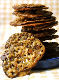 a stack of cookies sitting on top of a blue plate