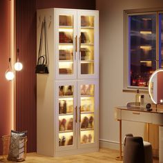 a room with a vanity, mirror and lighted cabinet in it's center area