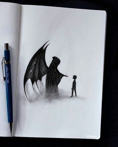 an open book with a drawing of a man and a dragon on it next to a pen