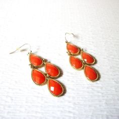 Gold Toned Orange Chandelier Pierced Earrings 71217 Gold toned metal Orange Acrylic inlays For pierced ears and 2 1/2 inches long Cheap Orange Retro Earrings, Orange Chandelier, Vintage Earrings Gold, Vintage Gold Earrings, Orange Jewelry, Pierced Earrings, Pierced Ears, Dance Outfits, Gold Tone Metal