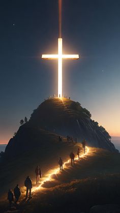 many people are walking up to the cross on top of a hill at night time