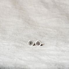 Flower Impression Round Silver Stud Earrings by Jester Swink - Jester Swink Edgy Earrings, Simple Accessories, Got Your Back, Stone Studs, Silver Stud Earrings, Handcrafted Earrings, Little Flowers, Flower Earrings Studs, Delicate Earrings