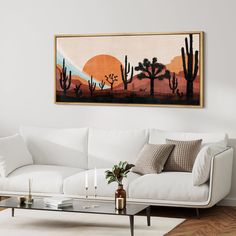 a living room filled with furniture and a painting on the wall