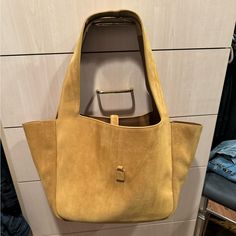 Genuine Suede Outer And Leather And Suede Inside Internal Pocket With Zipper. Dust Bag Included. 20” Across 10.5” Height 7.5” Deep Handle Drop 10” Color Is Sand Brand New Never Used Has Hook Closure Gold Tone Dust Bag, Gold Tones, Bag Lady, Shoulder Bag, Brand New, Zipper, Leather, Women Shopping, Gold