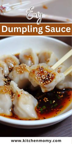 dumpling sauce in a white bowl with chopsticks