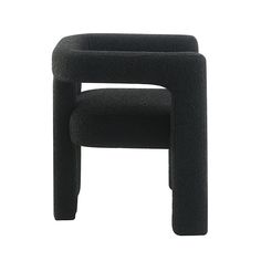 a black chair sitting on top of a white floor