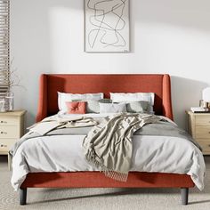 a bed sitting in a bedroom next to a dresser with drawers on top of it