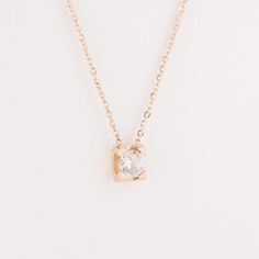 With vintage inspiration, this dainty diamond necklace is minimalistic, yet bold enough to catch the eye. The circular shape and clear cz stone are so versatile they can take you from an important meeting to an exciting night out.• Material: High Quality Stainless Steel• Finish: 18K Rose Gold | 18K Gold | Stainless Steel• Featuring a 6mm Round CZ Diamond Charm with adjustable chain 16 inches to 18 inches.• Waterproof Jewelry• Nickel Free Minimalist Cubic Zirconia Diamond Necklace For Formal Occasions, Rose Gold Diamond Solitaire Necklace For Wedding, Formal Minimalist Cubic Zirconia Diamond Necklace, Minimalist Solitaire Necklace In Diamond White For Formal Occasions, Minimalist Diamond White Solitaire Necklace For Formal Events, Minimalist Solitaire Necklace With Prong Setting For Everyday, Minimalist Everyday Solitaire Necklace With Prong Setting, Elegant Everyday Solitaire Pendant Necklace, Rose Gold Solitaire Necklace With Diamond Cut Cubic Zirconia