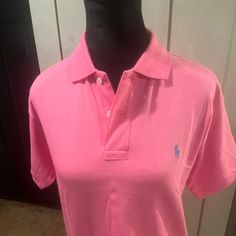 This Is A New With Tags Pink Ralph Women’s Size Large Hundred Percent Cotton Two Buttons At The Neck Shirt Put To Put 19 Inches Classic Pink Summer Tops, Classic Pink Summer Top, Classic Pink Tops For Summer, Pink Polo Collar Top For Summer, Classic Red Ralph Lauren Top, Classic Pink Relaxed Fit Top, Pink Ralph Lauren Shirt For Summer, Red Fitted Ralph Lauren Tops, Ralph Lauren Casual Summer Shirt