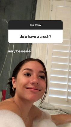 a woman taking a bath in a tub with foam on her face and the words do u have a crush? maybebeeeee