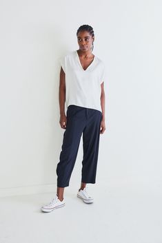 The devil is in the details. These tapered pants have a relaxed fit. Made with our iconic Core nylon fabric, these pants feel like loungewear. Tapered leg Belt loops 2 side pockets Vertical seams Note: the pockets are intentionally sewn loosely shut to protect the garment. Please cut the thread when you wear it to use your pockets. Effortless Relaxed Fit Straight Leg Pants, Versatile Tapered Leg Harem Pants For Loungewear, Effortless Pants With Loosely Fitted Hips And Tapered Leg, Relaxed Fit Tapered Leg Loungewear Pants, Relaxed Straight Leg Work Pants, Relaxed Fit Tapered Leg Pants For Loungewear, Effortless Relaxed Fit Tapered Leg Pants, Relaxed Fit Tapered Pants With Elastic Waistband, Straight Leg Harem Pants For Loungewear