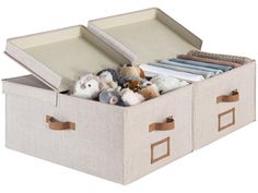 an open storage box filled with stuffed animals