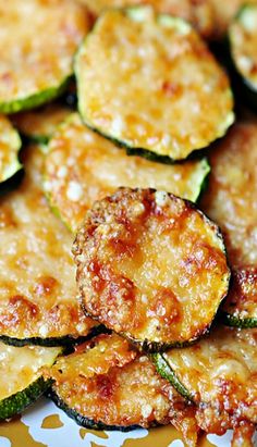 zucchini fritters on a plate ready to be eaten