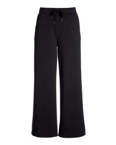 Crafted from a soft knit with a hint of stretch, our Luxe Lounge Drawstring Wide Leg Pant offers effortless polish. Designed with an elastic drawstring waist and slash pockets for added convenience, it pairs beautifully with our mock neck top for a refined-casual look. | Boston Proper - Black - Luxe Lounge Drawstring Wide Leg Pant - XXS Versatile Drawstring Sweatpants For Loungewear, Versatile Wide Leg Pull-on Lounge Pants, Fall Wide Leg Pull-on Pants For Loungewear, Versatile Pull-on Wide Leg Pants For Loungewear, Fall Athleisure Wide Leg Pants For Lounging, Chic Stretch Sweatpants For Lounging, Chic Fall Activewear For Loungewear, Chic Solid Activewear For Loungewear, Chic Fall Loungewear Activewear