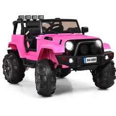 a pink toy jeep with lights on it's front wheel and four wheels, is shown