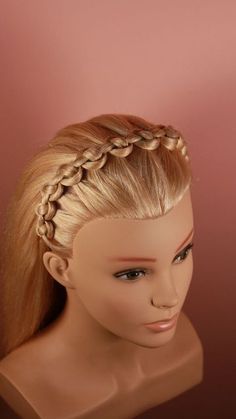 A braided crown is a gorgeous and whimsical hairstyle that gives a regal touch to your homecoming look. To create this style, part your hair down the middle and braid two sections on each side of your head. Wrap each braid around the crown of your head and pin them in place. This hairstyle works best on medium to long hair and gives off a romantic, boho vibe that’s perfect for homecoming. Targaryen Braids, Quinceanera Hairstyle, Hair Designs For Girls, Braid Crown Tutorial, Crown Braids, Braid Crown, Braided Crown