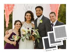 a group of people standing next to each other in front of a sign with flowers