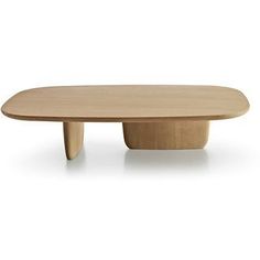 an oval wooden table with two legs on the top and one leg raised up to the side