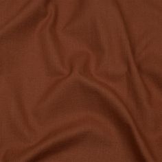 an image of a plain brown fabric textured with some sort of clothing material