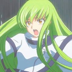 an anime character with green hair making a funny face