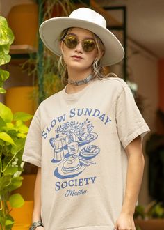 Slow Sunday Society Vintage Graphic Comfort Colors Tee. * Comfort Colors 1717 Garment dyed Unisex T-shirt * Medium fabric (6.1 oz/yd² (206.8 g/m * Relaxed fit, unisex * 100% ring-spun cotton == RETURNS OR EXCHANGES == Since each shirt is custom printed to order, we are unable to accommodate returns or exchanges based on color or fit/size. However, if you have any issues with your shirt, please reach out to us, and will replace it ASAP. == SIZE == Please check the size guide in the images section Aesthetic Tshirt Graphic Tees, Vintage Brunch, Boho Tshirt, Club Tshirt, Slow Sunday, Boho Tshirts, Aesthetic Clothing, Graphic Apparel, Cool Graphic Tees