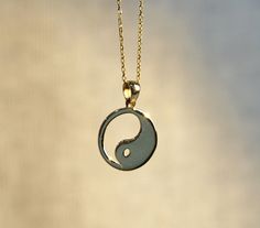 Our yin yang necklace is 14k solid gold. It has a simple and minimalist style that everyone from 7 to 70 loves it!  If you think of this gold yin yang pendant necklace as a gift, it will be a perfect gift for making happy your loved ones on their birthdays, mother's day, graduation, anniversaries, or valentine's day. 🎁 We can add a gift note for your loved ones. It arrives in a special jewelry gift box.  ✨ We respond to your questions happily. Your question will be answered within 24 hours. Do Bull Pendant, Yin Yang Jewelry, Yin Yang Charm, Yin Yang Necklace, Zodiac Taurus, Symbol Necklace, Zodiac Pendant, Taurus Zodiac, Necklace Minimalist