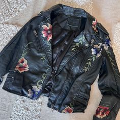 Never Worn. Purchased In 2017. Size S. Fits Tight In The Arms. I Would Consider Sizing Xs/S. I’m 5’3 - 81cm/66cm/90cm And It Fits Too Tight For Me. Has A Bit Of Wear On The Collar From The Leather Coming Off. Trendy Fitted Leather Jacket For Spring, Fitted Leather Jacket With Floral Embroidery For Winter, Winter Floral Embroidered Fitted Leather Jacket, Trendy Embroidered Leather Jacket For Spring, Casual Embroidered Fitted Leather Jacket, Casual Fitted Embroidered Leather Jacket, Casual Biker Jacket With Floral Embroidery, Fitted Leather Jacket With Floral Embroidery, Spring Black Outerwear With Floral Embroidery