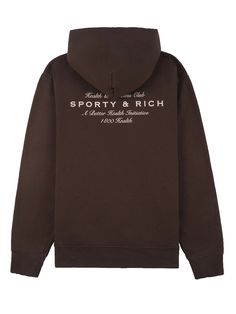 Sporty&rich sweatshirt ws066s410hc chocolate brown cotton sporty&rich hoodie with front pockets white logo on the chest and back lettering.  made in usa.  fabric/material: cotton | 100% cotton. Sporty Crew Neck Hoodie With Logo, Luxury Sporty Logo Hoodie, Luxury Sporty Crew Sweatshirt, Luxury Oversized Sporty Hoodie, Sporty And Rich Hoodie, Sporty And Rich Sweatshirt, Denim Hat, Sporty And Rich, Cotton Cardigan