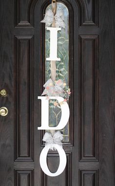 the front door is decorated with white letters