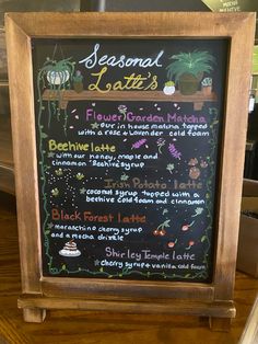 a chalkboard sign with some writing on it that says seasonal latin's in english and spanish