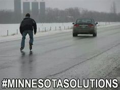 a man is skateboarding down the road in front of a car