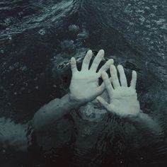 two hands reaching for each other in water with the words if you could only save me, i'm growing in the waters of my soul