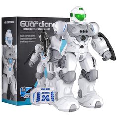 a white robot toy in front of a box with instructions on how to use it