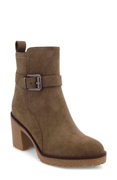 A buckled strap adds a utilitarian-inspired element to a bold bootie set on a chunky block heel and durable lug sole. 3" heel; 1/2" platform 4 3/4" shaft Side zip closure Contoured footbed Synthetic upper, lining and sole Imported Mia Shoes, Slouched Boots, Stylish Boots, Trending Sneakers, Western Cowboy Boots, Fall Shoes, Buckle Belt, Espadrille Shoes, Lug Sole