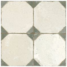 a white and grey checkered tile floor with gray grouting in the middle