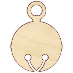 a wooden cutout of a round object with two spoons in the shape of a face