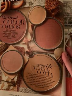 the inside of a magazine with three different shades of pink and brown on it, one is