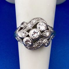 * Art Nouveau Art Deco Platinum Diamond Floral Cluster Engagement Cocktail Ring * Ring Size: 5.00 * Top of ring measures: 5/8" x 3/4" * Round Diamond carat weight: approximately .50 tcw * Diamond color: H-I * Diamond clarity: SI * Weight: 6.0 tgw * Marked: makers marks 50 plat * Condition: Great * Item will be shipped via Register Mail will being video surveilled with a Notary Public and two witnesses.  * (G54)    Exported By ExportYourStore :) Dazzling Multi-stone Platinum Diamond Ring, Dazzling White Gold Diamond Ring With Multi-stone, Dazzling White Gold Multi-stone Diamond Ring, Platinum Cluster Multi-stone Diamond Ring, Platinum Multi-stone Cluster Diamond Ring, Fine Jewelry Platinum Multi-stone Diamond Ring, Fine Jewelry Multi-stone Platinum Diamond Ring, Multi-stone Platinum Diamond Ring In Fine Jewelry Style, Platinum Multi-stone Diamond Ring Fine Jewelry