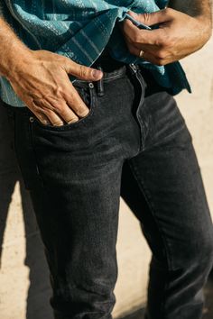 Our premium denim is inspired by the classic vintage blue jean. Our Premium Japanese 4-Way Stretch Selvedge denim story starts in Japan where our fabric is developed at one of the oldest denim mills. We blend a unique 4 way stretch material with selvedge denim to create a specific amount of stretch and comfort you wouldn’t typically get with selvedge denim. This 360 degree of stretch gives the wearer comfort from every angle no matter what they are doing. Our 4-Way Stretch selvedge fabric is wea Classic Washed Black Rigid Denim Jeans, Classic Washed Black Jeans, Classic Washed Black Tapered Leg Jeans, Classic Washed Rigid Denim Jeans, Black Recycled Denim Jeans With Five Pockets, Black Jeans With Five Pockets In Recycled Denim, Classic Everyday Washed Jeans, Classic Fitted Washed Jeans, Everyday Washed Black Denim Jeans