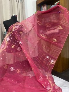 A Primium Touch of beauty in a classy traditional Dhakai Jamdani saree from the origin of Dhakai Sarees ie,Dhaka ,Bangaladesh. A elegant Fushia Pink color with Gold Silver and rose gold , zari made it a gorgeous master piece to make you really beautiful. Saree is 80 count primium half Silk dhakai jamdani saree ,handweaved by the masterweavers of Bangaladesh. Saree comes with Blouse piece. Saree length 5.5 mtr apporx Blouse piece 1 mtr approx Dry cleaning recommend. Due to digital photography col Festive Pre-draped Saree In Cotton Silk With Traditional Patterns, Transitional Chanderi Pre-draped Saree With Traditional Patterns, Bollywood Style Pre-draped Saree For Traditional Ceremonies, Festive Tussar Silk Saree With Traditional Patterns, Festive Chanderi Pre-draped Saree With Traditional Patterns, Traditional Pink Cotton Silk Dupatta, Pink Cotton Silk Traditional Dupatta, Handloom Tussar Silk Saree For Traditional Ceremonies, Traditional Slub Silk Saree With Zari Work