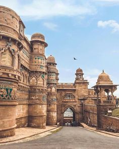 the entrance to an elaborately designed building in india