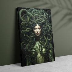 a woman with green hair and snakes on her head is shown in front of a wall