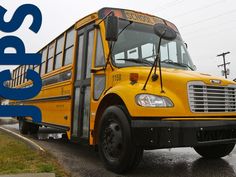 a yellow school bus is parked on the street