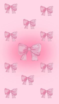 several pink bows on a light pink background