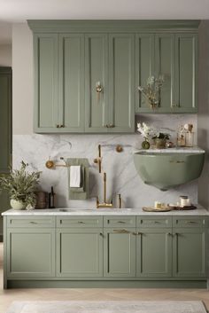 1. Sage green cabinets
2. Top picks for elegance
3. 2024 kitchen trends
4. Ultimate sophistication Classic Farmhouse Kitchen, English Cottage Kitchens, Shaker Kitchen Design, Kitchen Faucet Design, Laundry Room Colors, Faucet Design, Design A Space