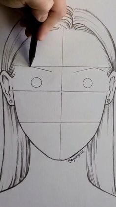 someone is drawing a woman's face on paper