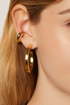 Flat thick round earring hoops that are the epitome of trendy comfort for their unique style and astonishing light weight.